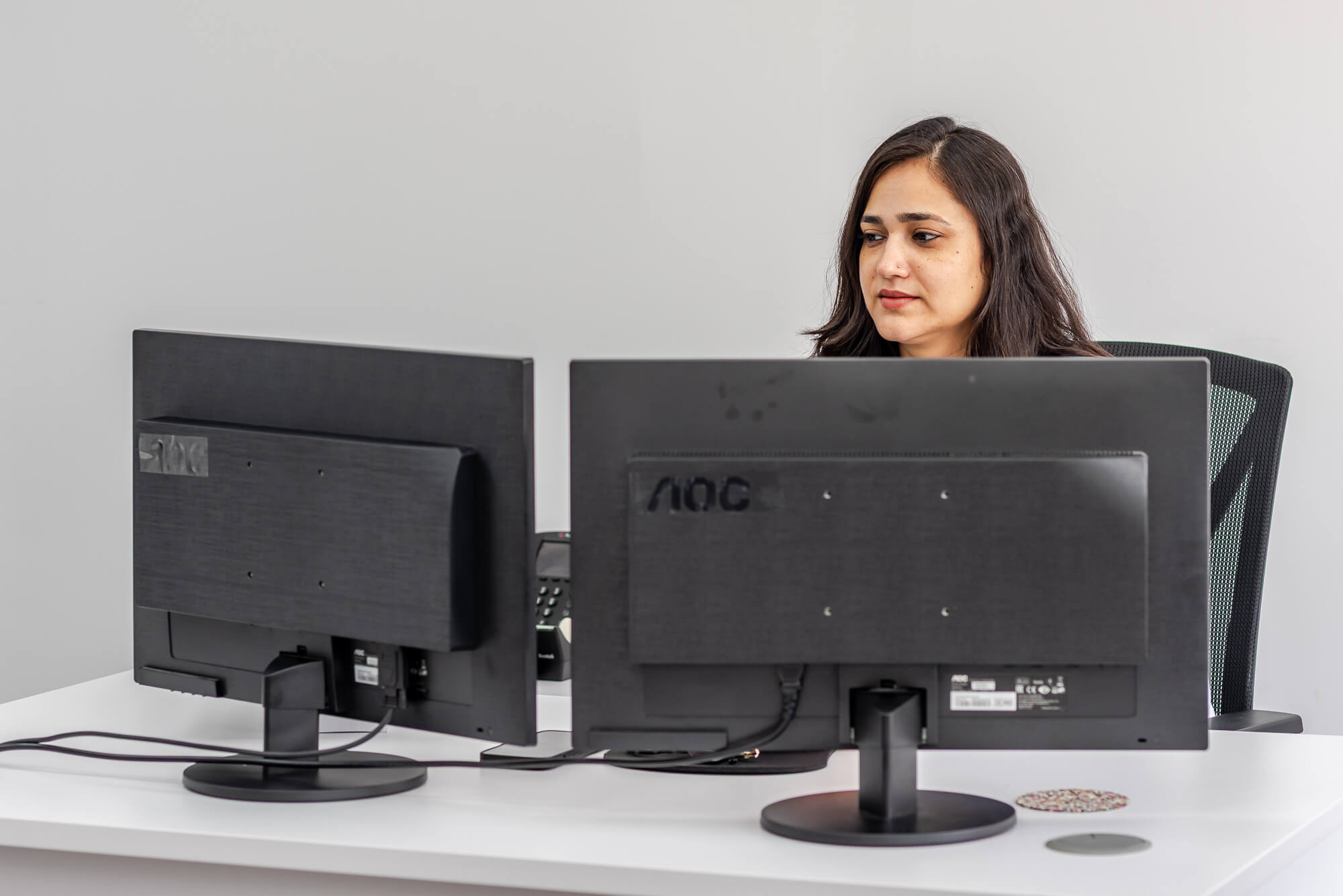 Gunjan Kataria reviewing bookkeeping records